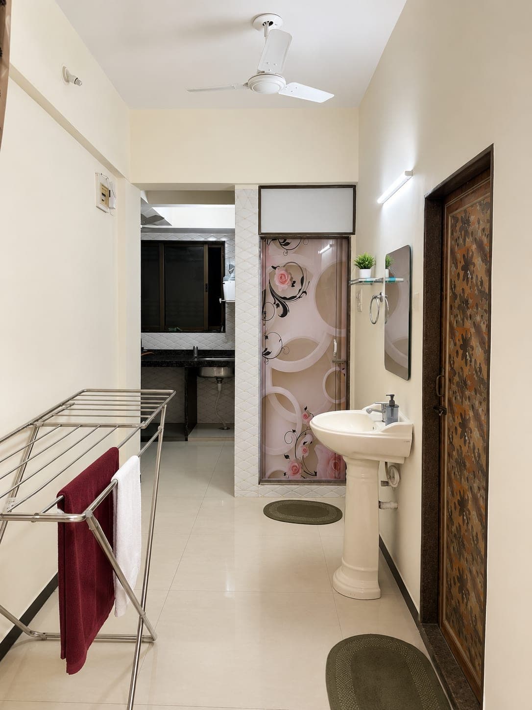 Shared washbasin and clothes-drying area outside the kitchen